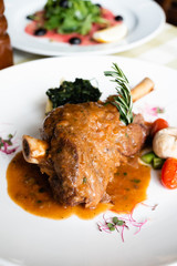 Stinco Di Agnello Brasato, braised lamb shank red wine sauce