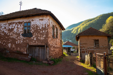 Old rustic idyllic houses in a village Topli do on Old Mountain (stara planina) in Serbia