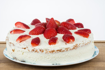 Strawberry cake with cream and cottage cheese.