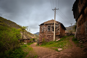 Fototapeta na wymiar Old rustic idyllic houses in a village Topli do on Old Mountain (stara planina) in Serbia