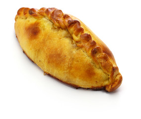 homemade saltena, empanada with a juicy filling, Bolivian breakfast