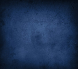 Naklejka premium Blue textured concrete dark wall background