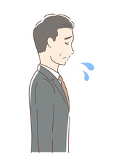 悲しむ男性の横顔