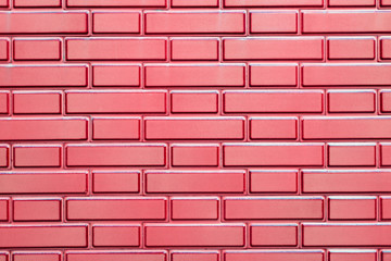 Red colored squared wall. Pattern.