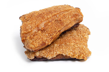 Close up view of crispy pork belly or deep fried pork isolated on white background with clipping path.