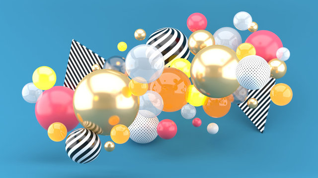 Golden balls and colorful balls floating on a blue background.-3d rendering.