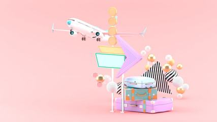 Obraz premium Hotel signs, suitcases and planes amidst colorful balls on a pink background.-3d rendering.