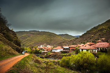 Fototapeta premium Old rustic idyllic houses in a village Topli do on Old Mountain (stara planina) in Serbia