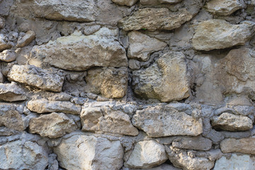 beige and cream wild stone wall texture
