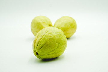 Guava, tropical fruits originated from Malaysia, shot on a white isolated background.