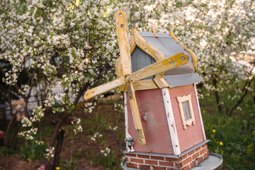 Decorative wooden mill in the garden