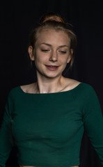 teengirl in green shirt laughes