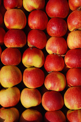 Fresh ripe red apples as background