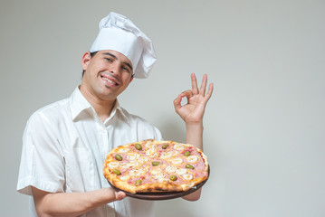 portrait cook with pizza on a light background
