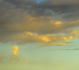 Dark and moody low altitude clouds at sunset. 