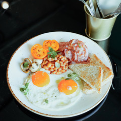 Dish breakfast dinner time plate table black coffee juice musli eggs bread cheesecakes porridge macaroni water menu for cafe restaurant 