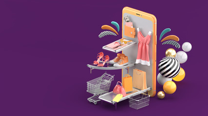 The fashion house on the smartphone is surrounded by colorful balls on a purple background.-3d...