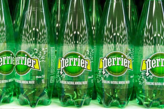 Tyumen, Russia-may 04, 2020: mineral water bottles Perrier. French brand of premium mineral water. Selling in the hypermarket