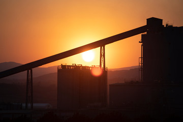 Part of the thermal power plant and sunset.