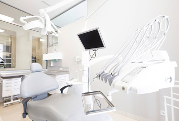 Interior of dental office, professional equipment, white furniture