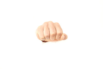 Male fist punching through paper isolated on white
