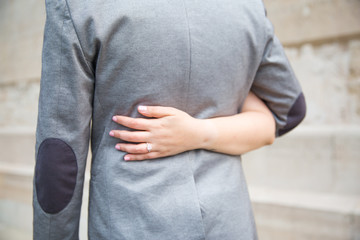 Man and Woman Holding Each Other by the Waist Showing Wedding Ring