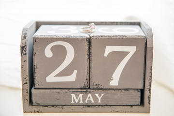 Rings on 27th of May Wedding Anniversary Date made of Wooden Cubes