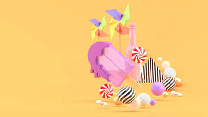 Ice cream sticks, candy, soft drinks bottles and paper turbines surrounded by colorful balls on an orange background.-3d rendering..