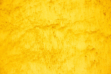 yellow wall of a building in the city with texture