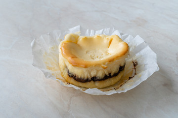Homemade Basque Cheesecake with Chocolate Cream Round Shaped.