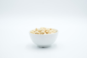 Cashew nut shot on a white isolated background.