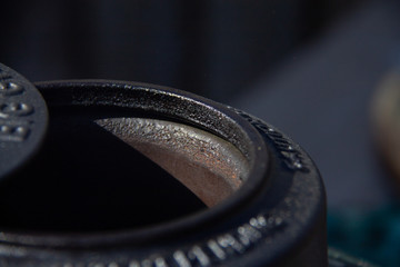 Smoking outlet from a BGE barbeque, the smoke is the air and the green BBQ