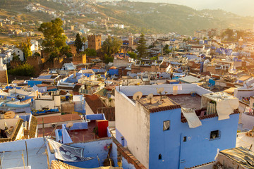 Sunset over the medina of Chefchaouen town, Morocco. Chaouen is Blue city. Reputation as center of the marijuana plantations region in north Morocco