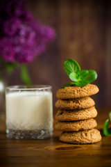 oatmeal cookies with a glass of fresh milk for breakfast