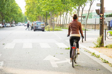 young woman riding a bike