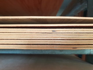 Stack of marine plywood cut to size placed on the rack