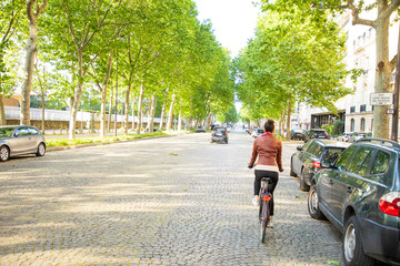 young woman riding a bike