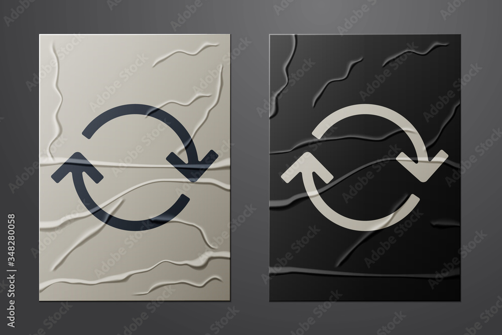 Poster white refresh icon isolated on crumpled paper background. reload symbol. rotation arrows in a circle