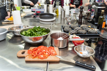 Different ingredients being processed for burgers
