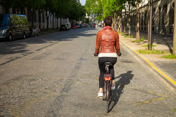 young woman riding a bike