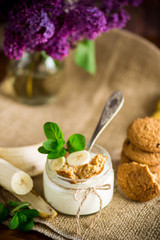 sweet homemade yogurt with fresh bananas and slices of oatmeal cookies