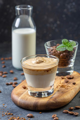 Cold milk with whipped coffee foam.