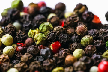 Background of different types of hot peppers .Multicolored pepper in the form of polka dots