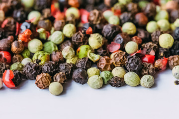 Background of different types of hot peppers .Multicolored pepper in the form of polka dots