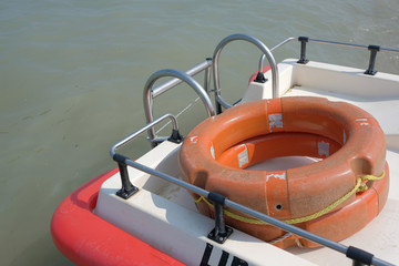 Lifebuoys on catamarans on Lake Garda.