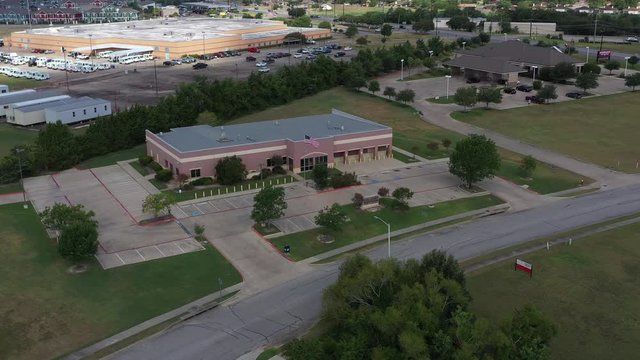 Suburban office building and parking lot, Bryan, Texas, USA
