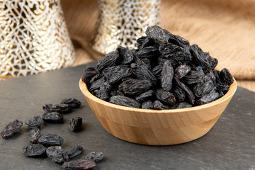 raisins in a wooden spoon