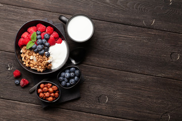 Healthy breakfast with granola, yogurt and berries