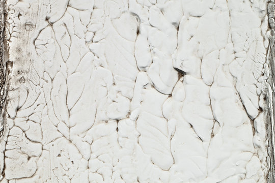 Closeup concrete wall texture with plaster and white paint