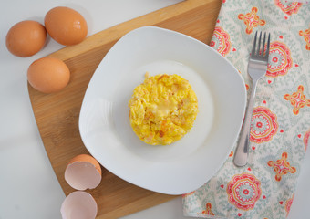 scrambled eggs in a white plate